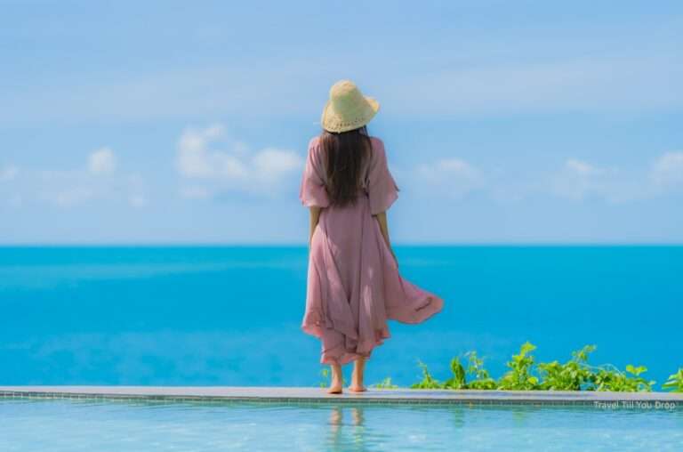 Maldives-travel-package-young-asian-woman-relax-smile-happy-around-outdoor-swimming-pool-hotel-resort-with-sea-ocean-view